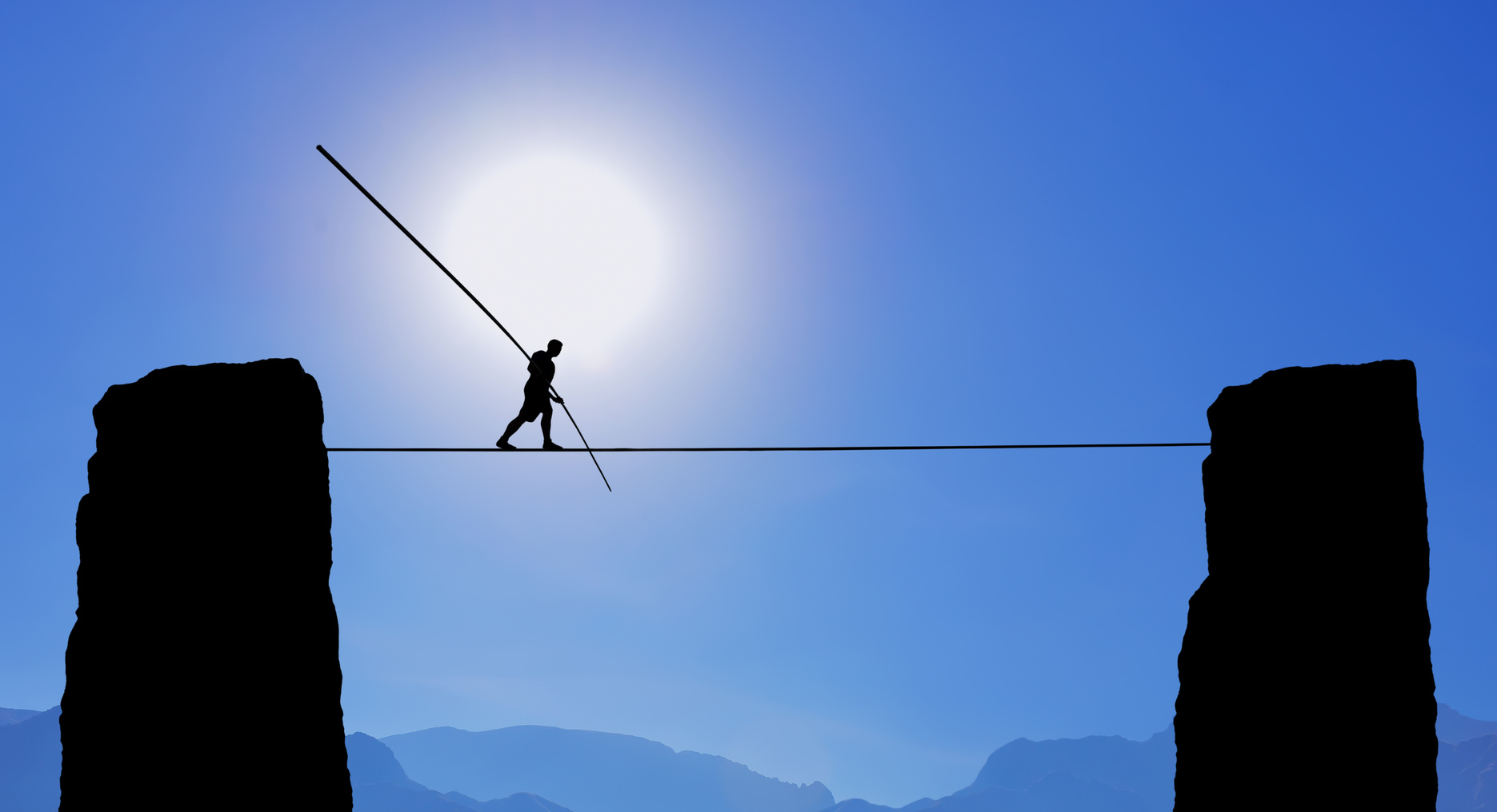 Tightrope Walker Balancing on the Rope